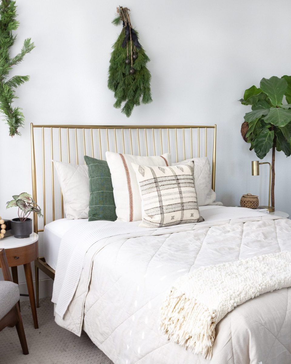 A wreath placed above the bed