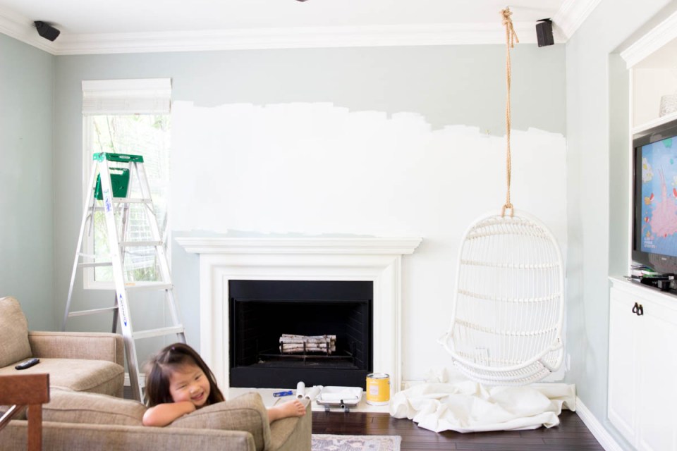 family room white paint hanging chair 