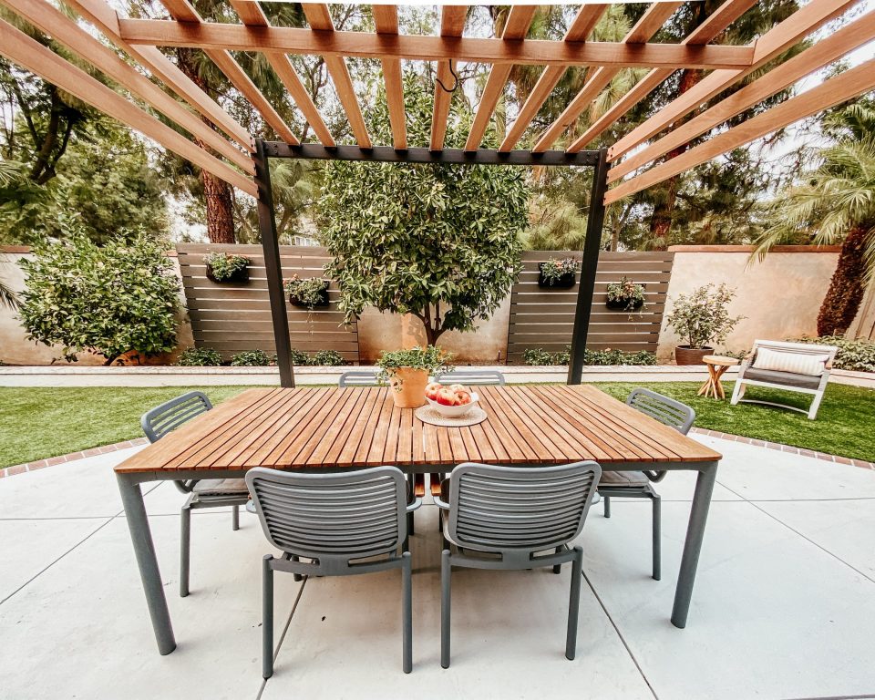 The backyard fence, seen from under the pergola