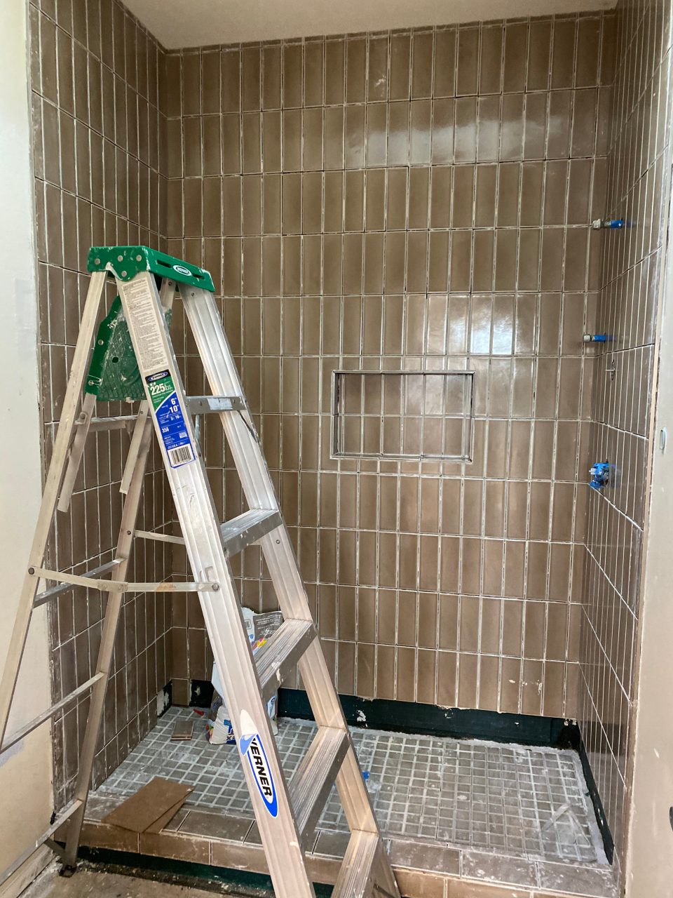 The new fireclay tile in our shower is looking good, but we're not done yet!