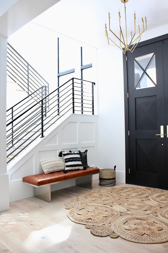 Entry with black railing