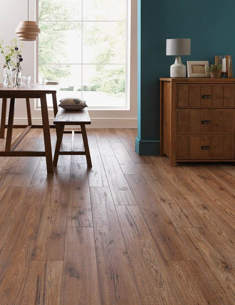 The Ultimate guide to Laminate Flooring // dining table bench hanging basket lamp wood buffet hutch laminate wood flooring dining room 