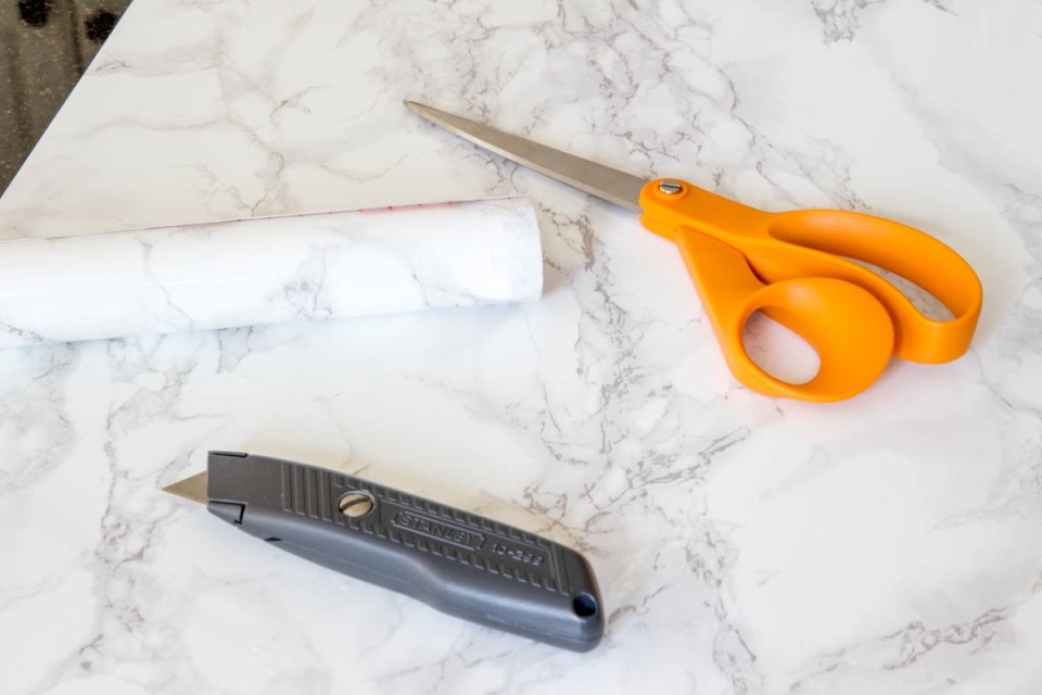 scissors box cutter faux marble counter top contact paper 
