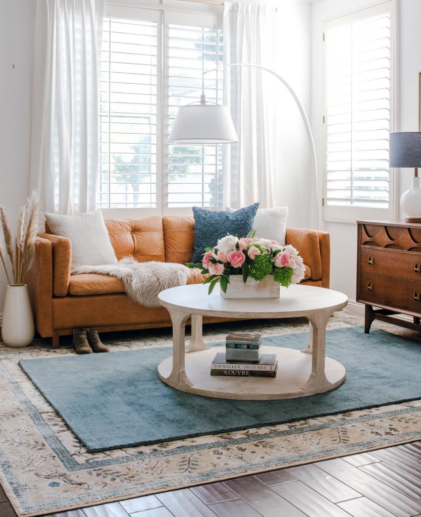  wood floors layered rugs mid century modern credenza