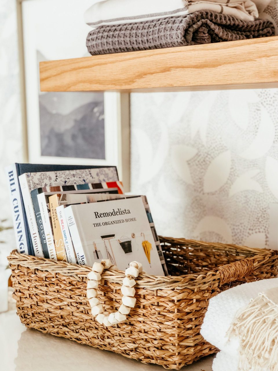 open shelving baskets organizing books parachute towels minted art 