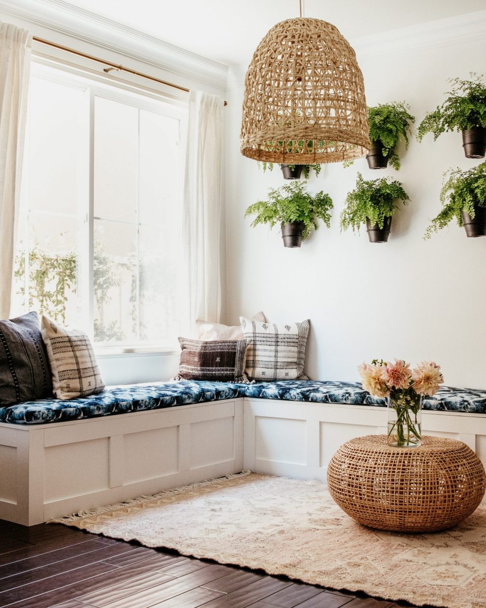 White Shaker Style Bench with blue cushions and wicker details