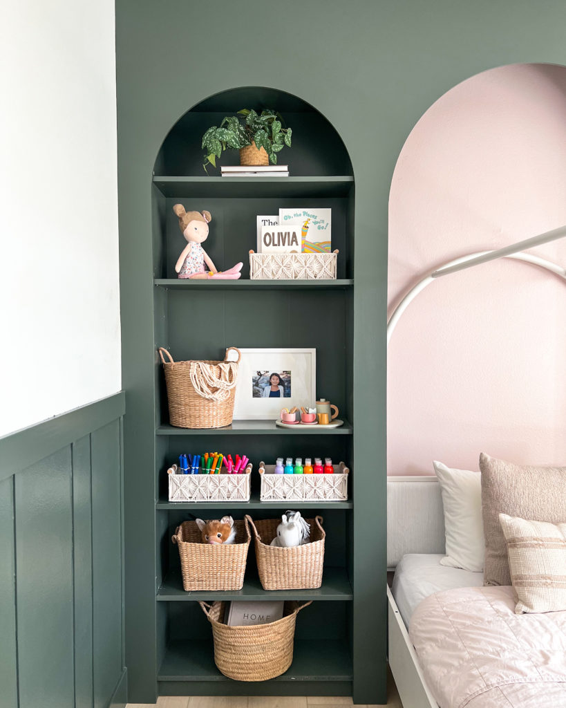 The shelves meet the wall paneling in this modern fairy tale